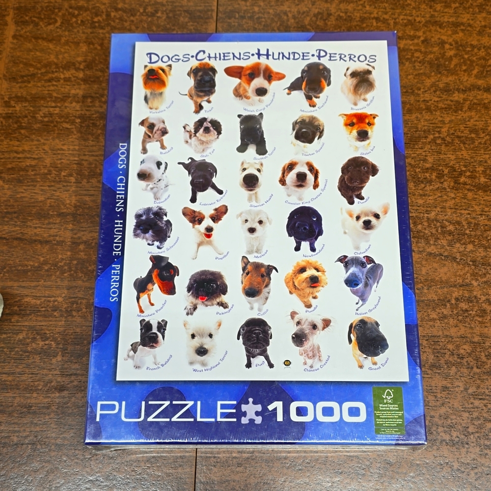 New unopened 1000pc dogs puzzle